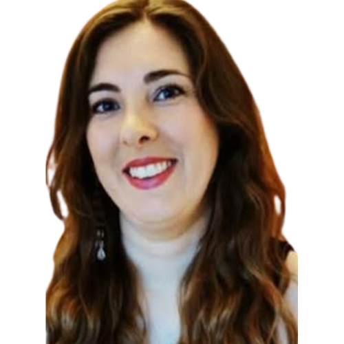 Smiling woman with long brown hair and earrings.