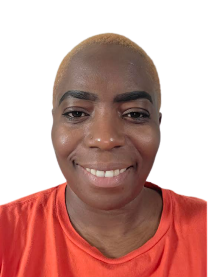 Person smiling in orange shirt